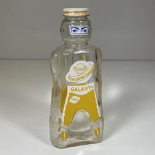 Vintage 1950's Galaxy Space Foods Spaceman Syrup Glass Bottle Bank Bombardier