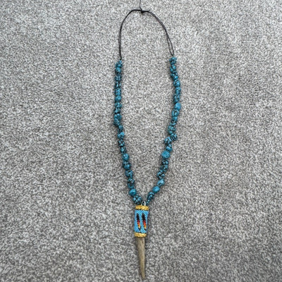 Handmade Necklace With Bone Pendant Wrapped In Beading On Blue Speckled Stones