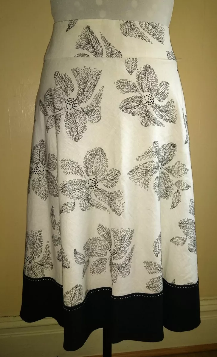 Black knee length top fit and flare skirt