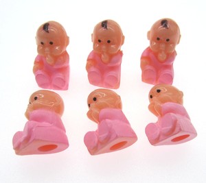 small plastic baby dolls