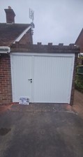Fully Fitted Vertical side hinged Garage door Open Out Ribbed Designer Install
