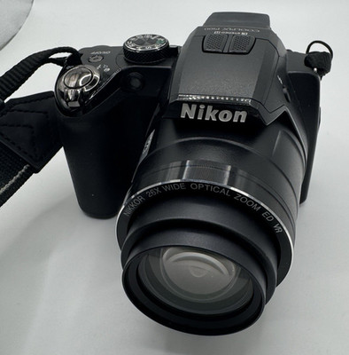 Nikon Coolpix P100 Digital Camera (Black) w/AC Adapter And Bag