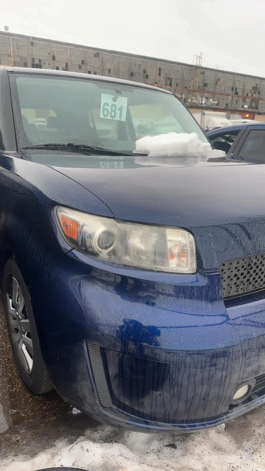 08-15 SCION XB eje delantero izquierdo Foto 4 de 4