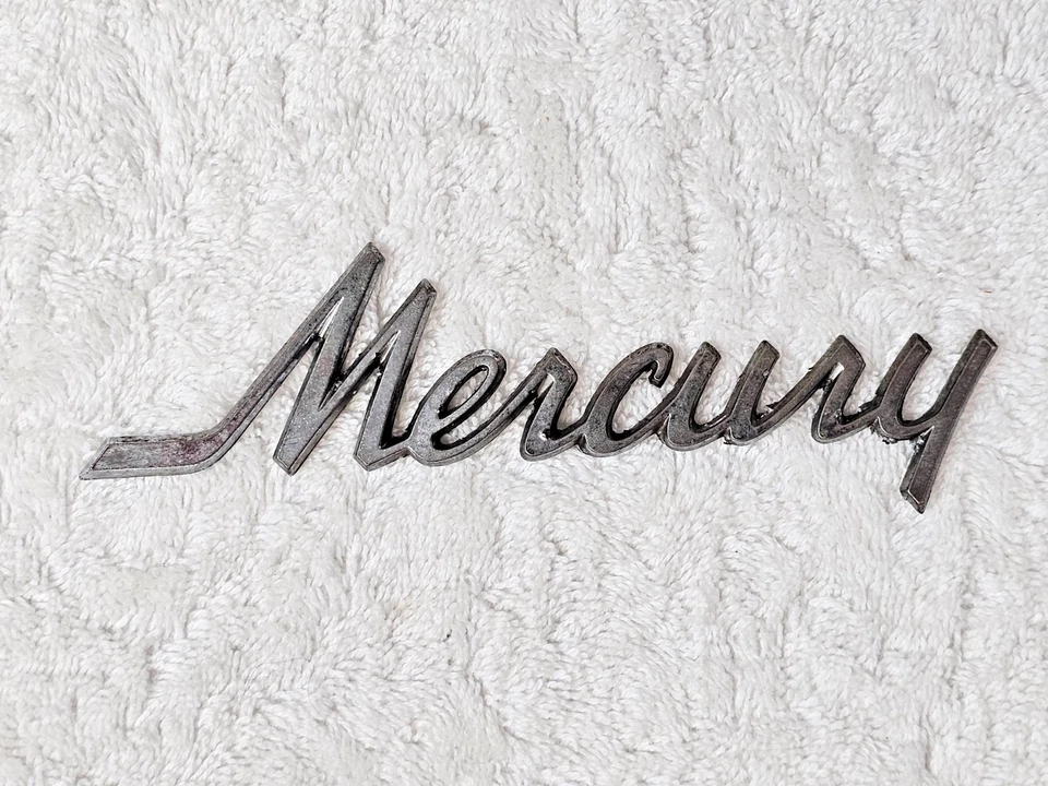 Mercury Script 1967 guardabarros emblema OEM FoMoCo C7GB-6742528-A original vintage Foto 2 de 4