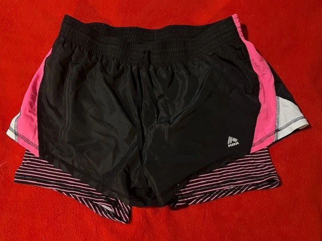 Pantalones Cortos de Correr 2 en 1 para Mujer RBX Talla L - Negros con Acentos Rosa y Forro a Rayas Foto 2 de 4
