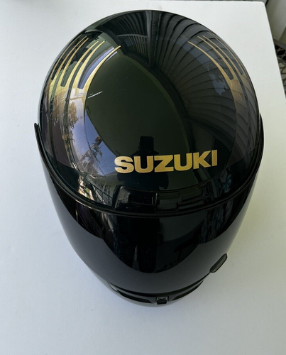 Motorcycle Helmet with Suzuki Logo by Snell . 7 1/8 - 7 1/4