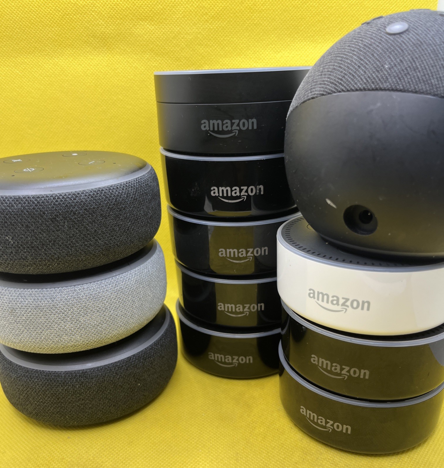 Lot of 12 Used Amazon Echo Devices with No Power Cords. Pictured.