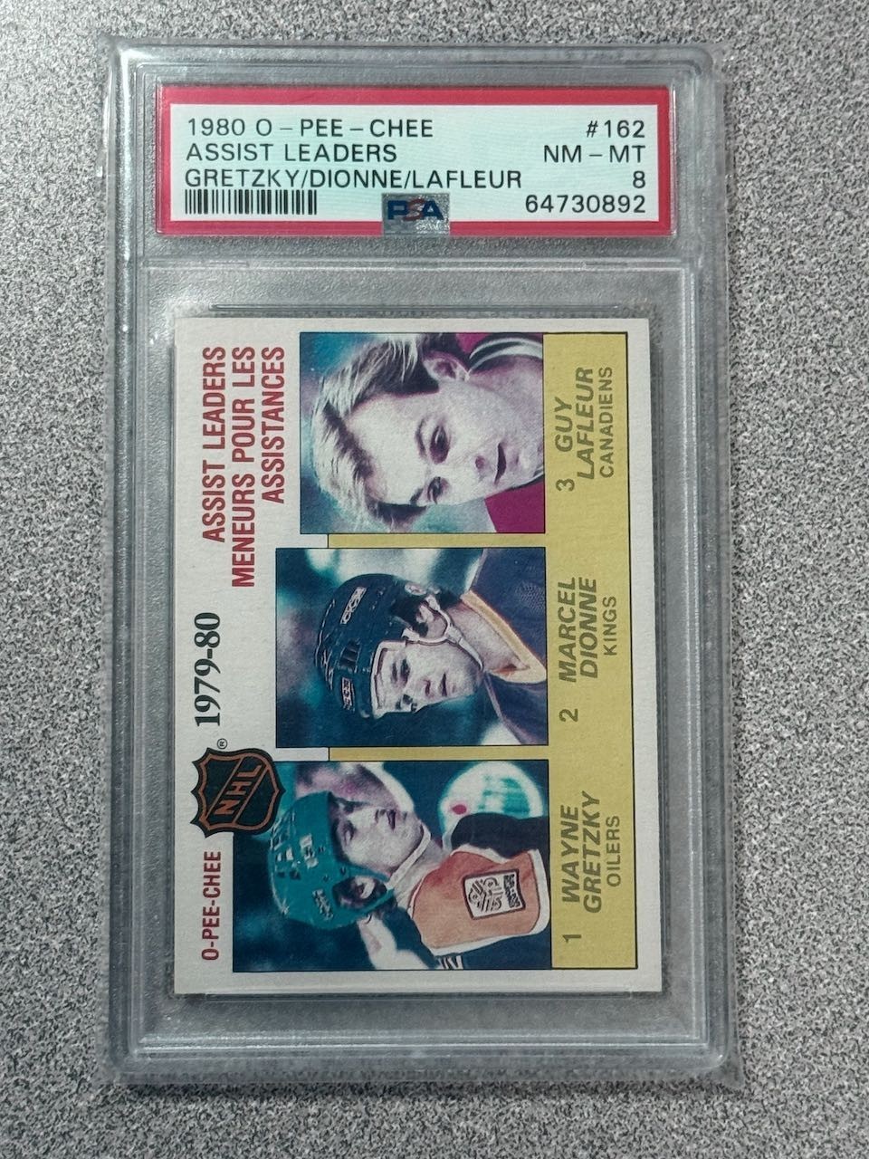 1980-81 80/81 OPC #162 Wayne Gretzky/Dionne/Lafleur - Assist Leaders - PSA 8