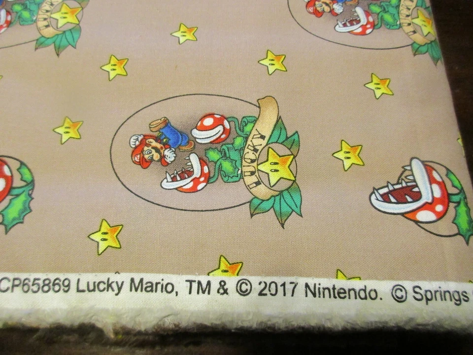 Insignia Lucky Mario tela de algodón marrón claro 1 cuarto grueso Nintendo Foto 3 de 3