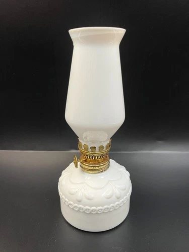 Beautiful vintage  miniature milk glass oil lamp, 19 cm high.