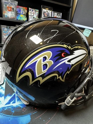 RAY LEWIS  #52 BALTIMORE RAVENS SIGNED RAVENS FULL SIZE REPLICA HELMET JSA CERT.