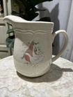 Vintage International Stoneware Marmalade Goose Pitcher With a pattern of geese