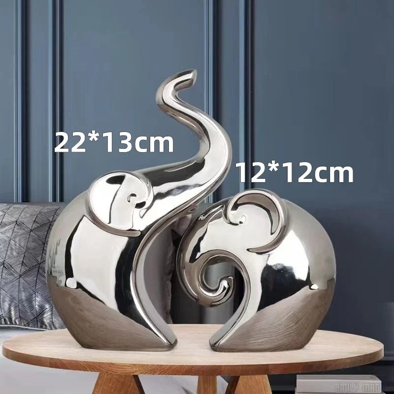 Statue éléphant abstrait duo argenté pour décoration de table basse chic