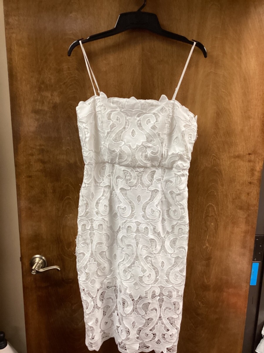 Women "Bardot" white eyelet design,spaghetti strap dress. Size 10