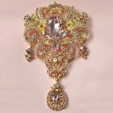 female brooch crown