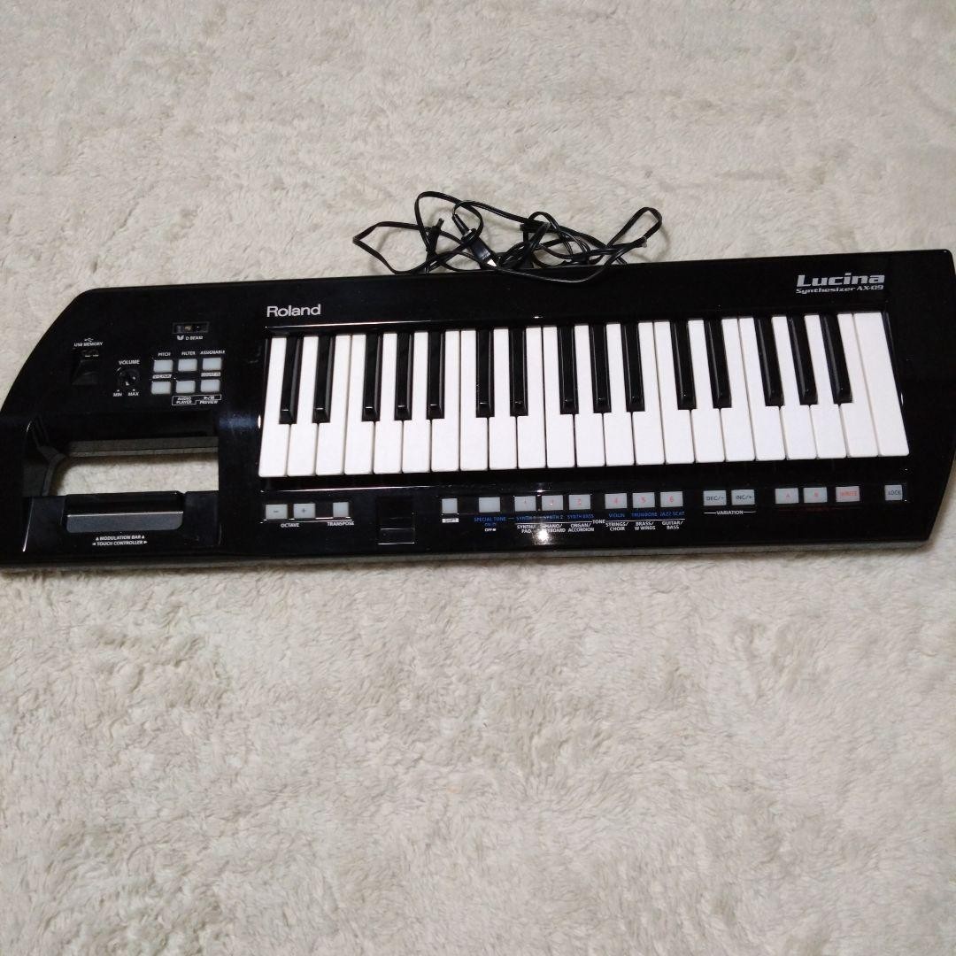 Roland AX-09 ショルダーキーボード/シンセサイザー Lucina Amazon | Roland / AX-09 LUCINA BLACK ローランド ショルダー