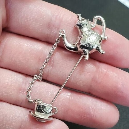 Avon silver tone teapot and cup brooch