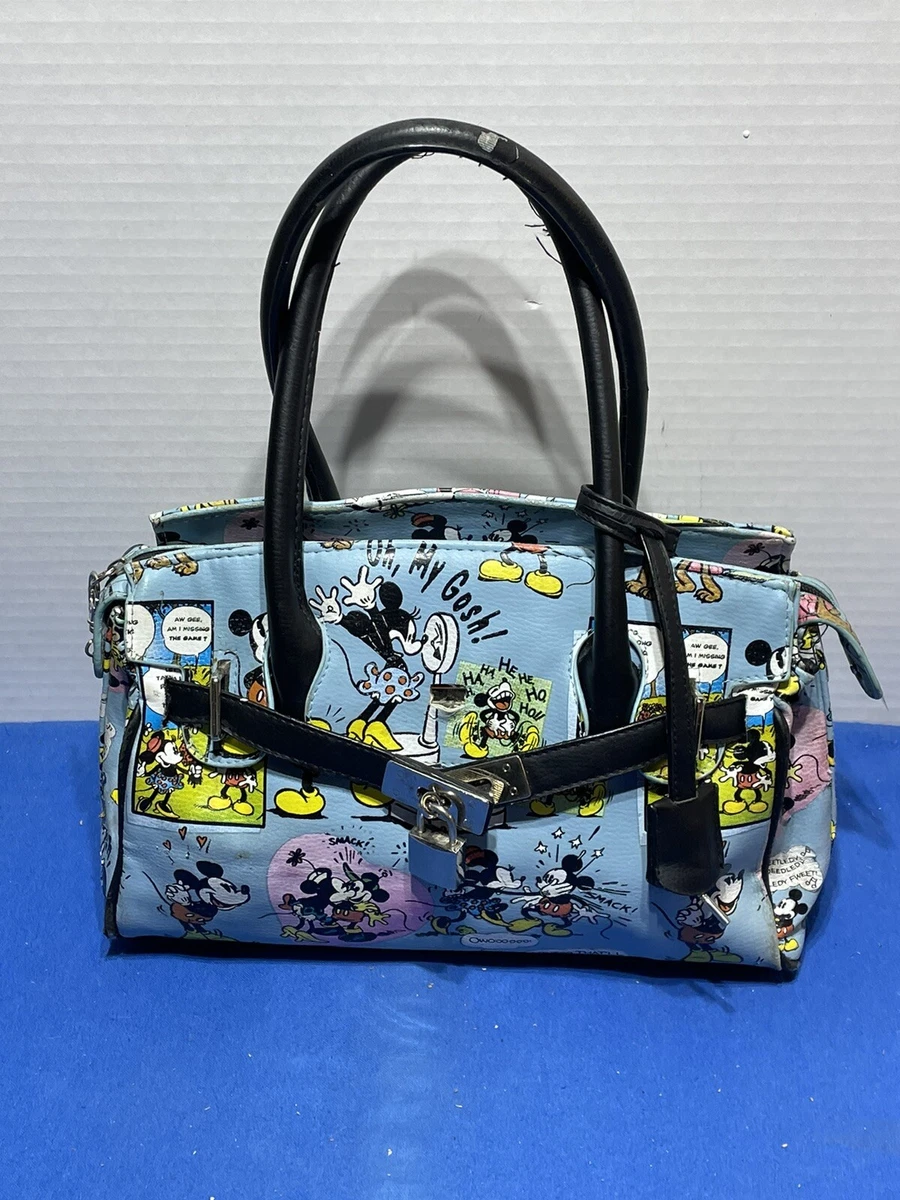 While looking for a classic, and adorable Mickey Purse, I stumbled