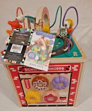 BRAND NEW FAO SCHWARZ BUSY CITY WOODEN ACTIVITY CUBE 12 MONTHS +. GREAT PRICE !!
