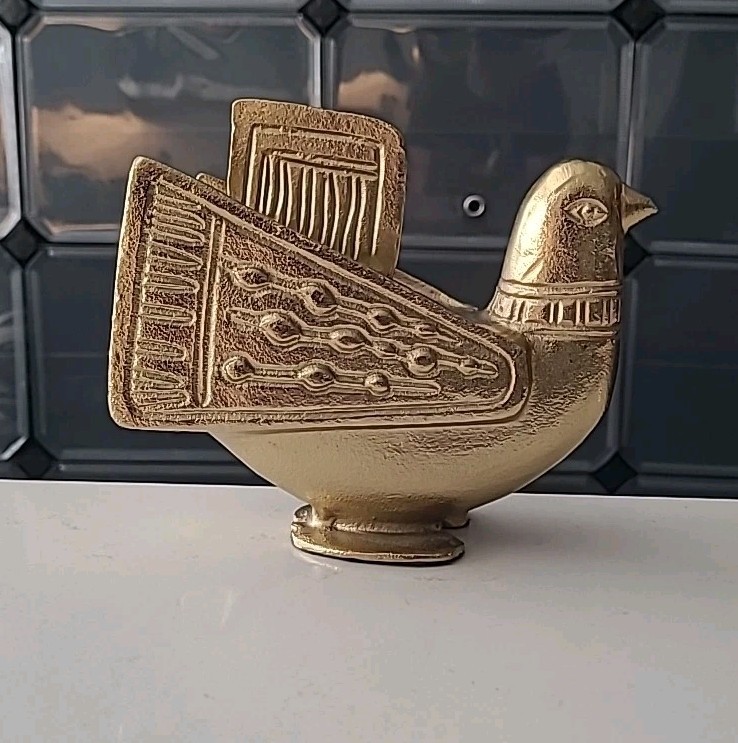 Weinberg die-cast metal bird sculpture — a solid, well-made vintage piece with the sleek minimalist lines MCM is famous for.