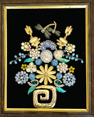 Vintage jewelry framed Art on velvet. Some jewelry with makers mark. Bouquet.