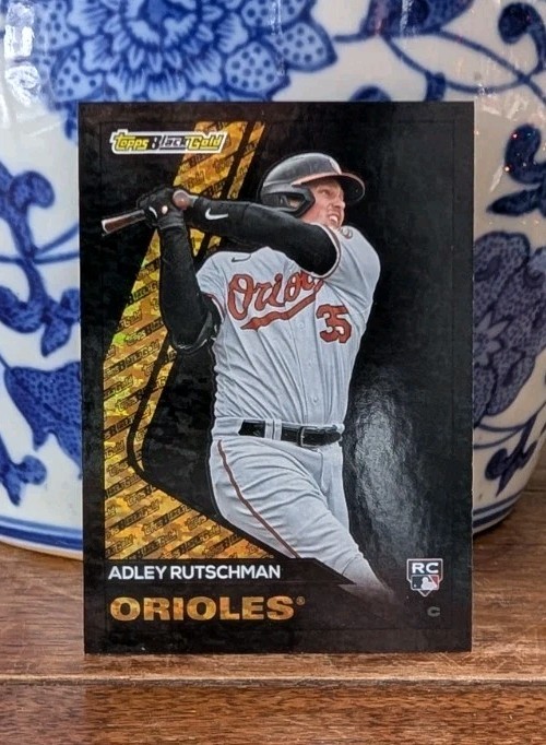 Adley Rutschman 2023 Topps Update Black Gold Black Parallel Rookie Card /299
