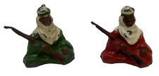 2 VINTAGE JOHN HILL CO BRITAIN HOLLOW CAST ARAB MEN SITTING W/ RIFLES LEAD TOYS