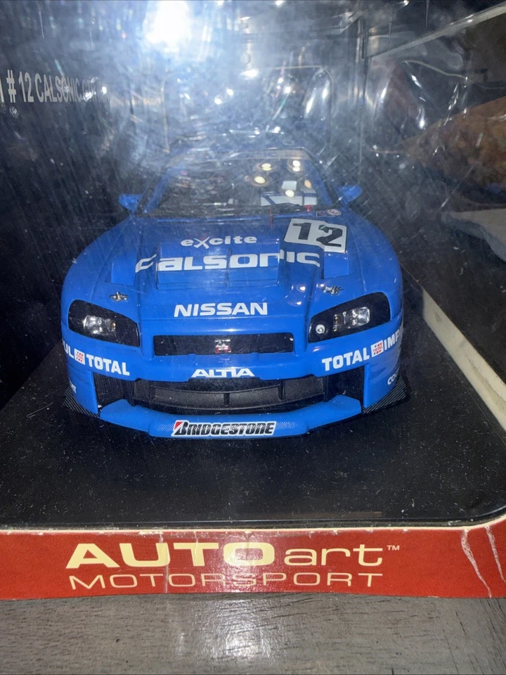 Coche diecast AUTOart 2002 Nissan Skyline R34 GTR #12 Calsonic JGTC 1:18 Foto 3 de 4