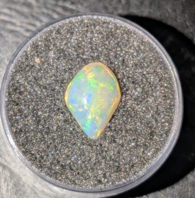 1.47 Carat Hand Polished Welo Ethiopian Opal  (11.6mmX8.4mmX3.7mm)