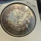 1904 O Morgan Dollar UNC beautiful purple bullseye toned reverse - rim toned obv