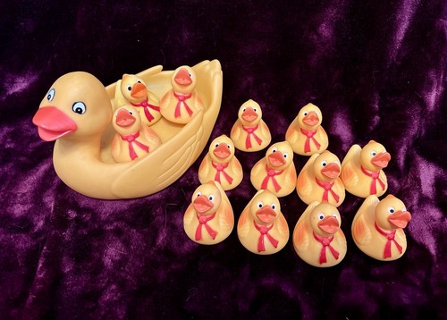 Rubber momma duck and lot of 13 baby rubber ducks for baby or toddler bath time