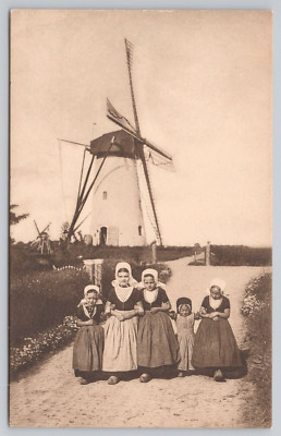 Postcard Traditional Dutch Girls in front of Windmill FB Den Boer, Middelburg