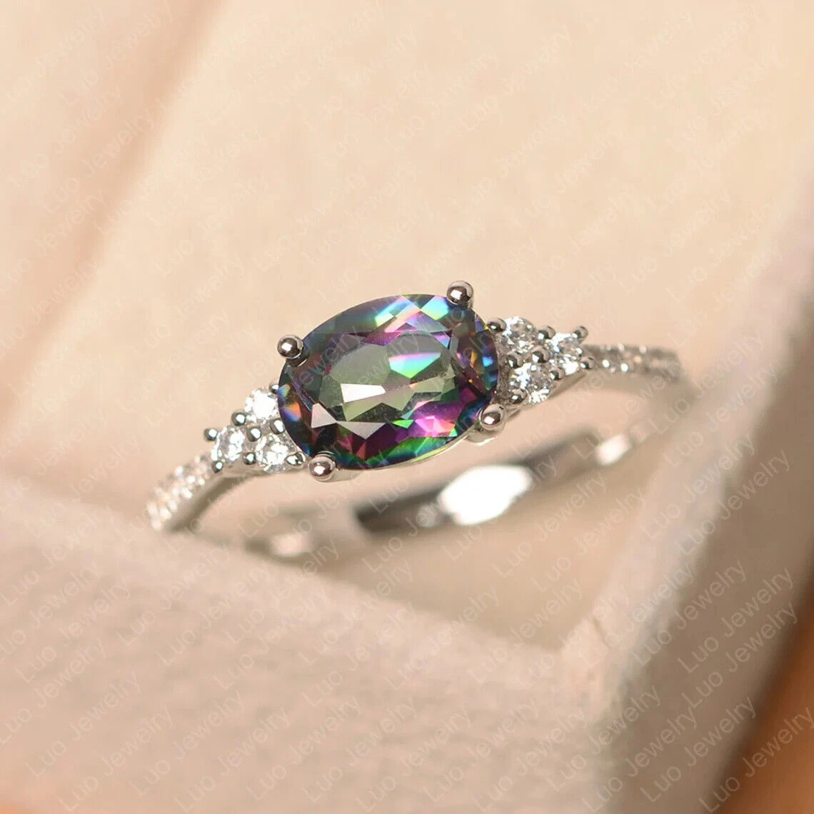 Rainbow topaz deals engagement ring