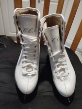 A Pair Of CCM Ladies White Figure Skates, Size 4