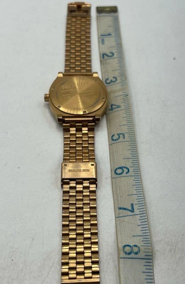 Reloj de cuarzo para hombre Nixon Minimal The Time Teller tono oro rosa 100M acero inoxidable Foto 2 de 4