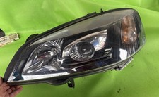 Original GM Hauptscheinwerfer links Xenon 13117077 OPEL ASTRA G Schwarz