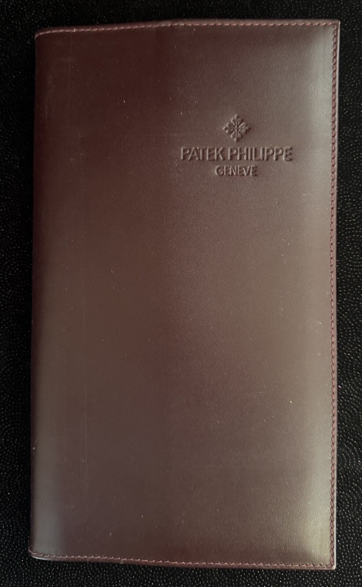 PATEK PHILIPPE LEATHER FOLDER with CERTIFICATE & MOVEMENTS BOOKLET