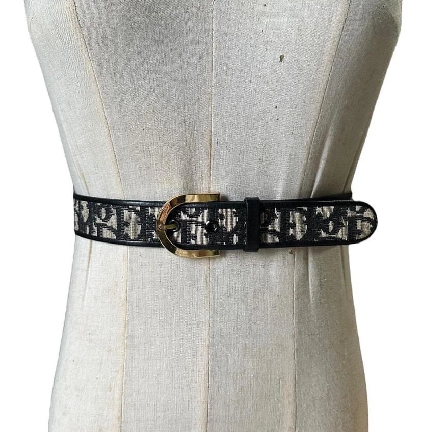 Ceinture Christian Dior monogramme toile noire cuir boucle dorée.