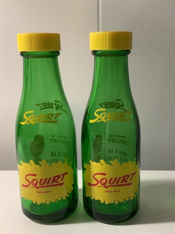 SQUIRT SODA BOTTLE Salt and Pepper Shakers Green Glass Yellow Top 🥤 