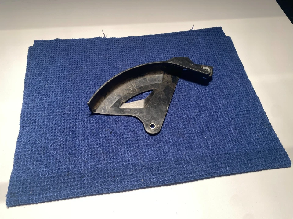 2004 03-05 YZ450F YZ 450F Pinza de freno trasera Protector de rotor Cubierta Frenos Foto 3 de 4