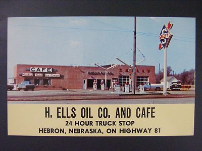 Hebron Nebraska H Ellis Oil Cafe Gas Pumps Skelly Ice Cream Signs Postcard 1950s