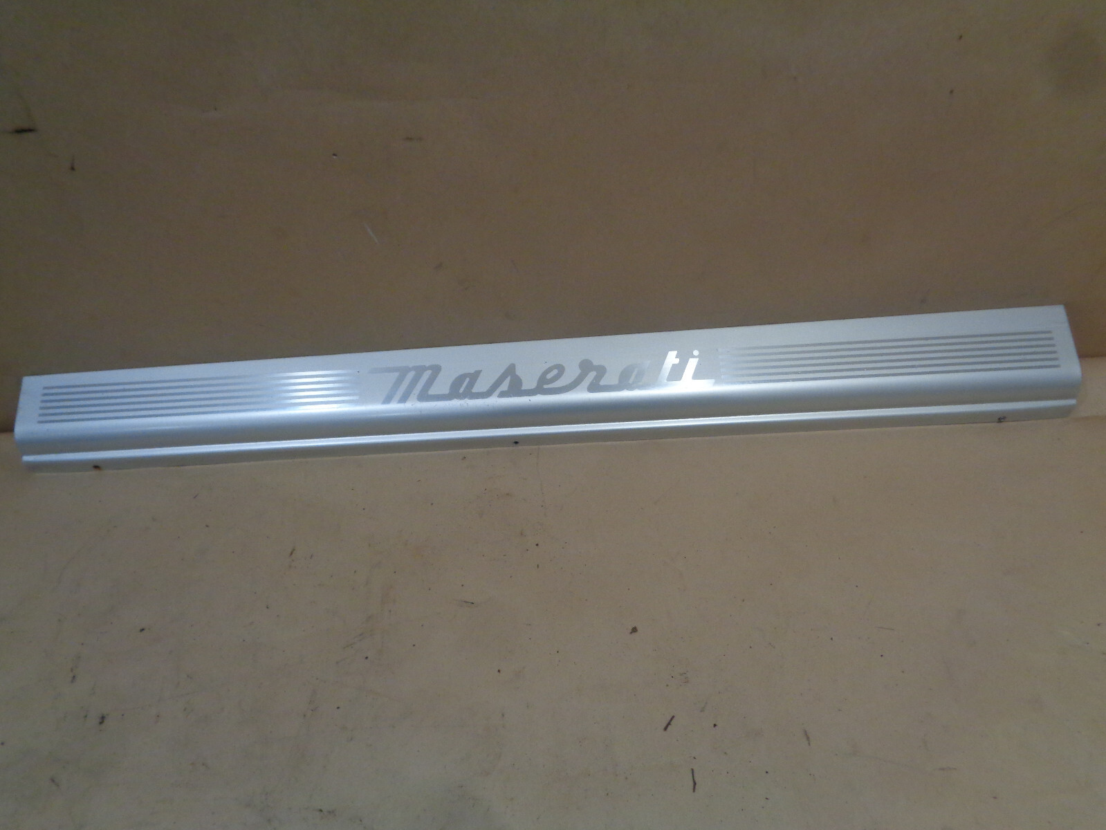 Maserati 4200 - LH Underdoor Moulding / Kick Plate - P/N  386100313
