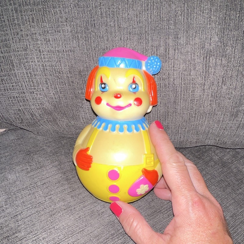 Fisher-Price Humpty Dumpty Roly Poly Clown Toy, Yellow Roly-Poly Figure