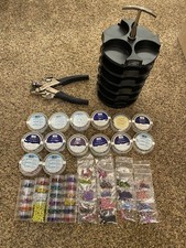 Stampin 'Up! Stack & Store, Crop-A-Dile, and multiple containers of eyelets