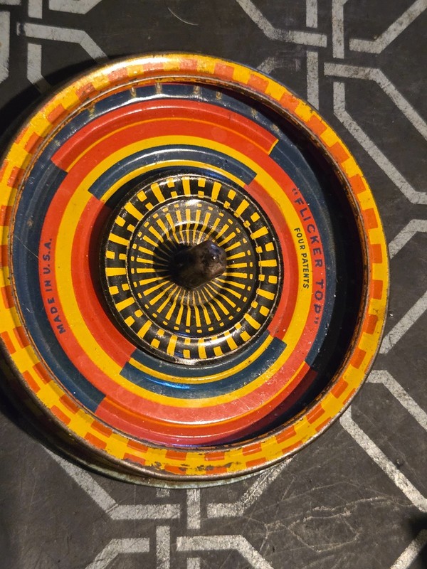Old Flicker Top Spinning Tin Toy Metal Spins Illusions 4.5" 1920's