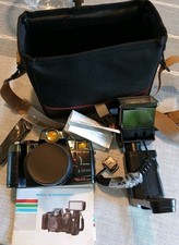 Canon Q8200A 35mm Camera With Flash And Case.