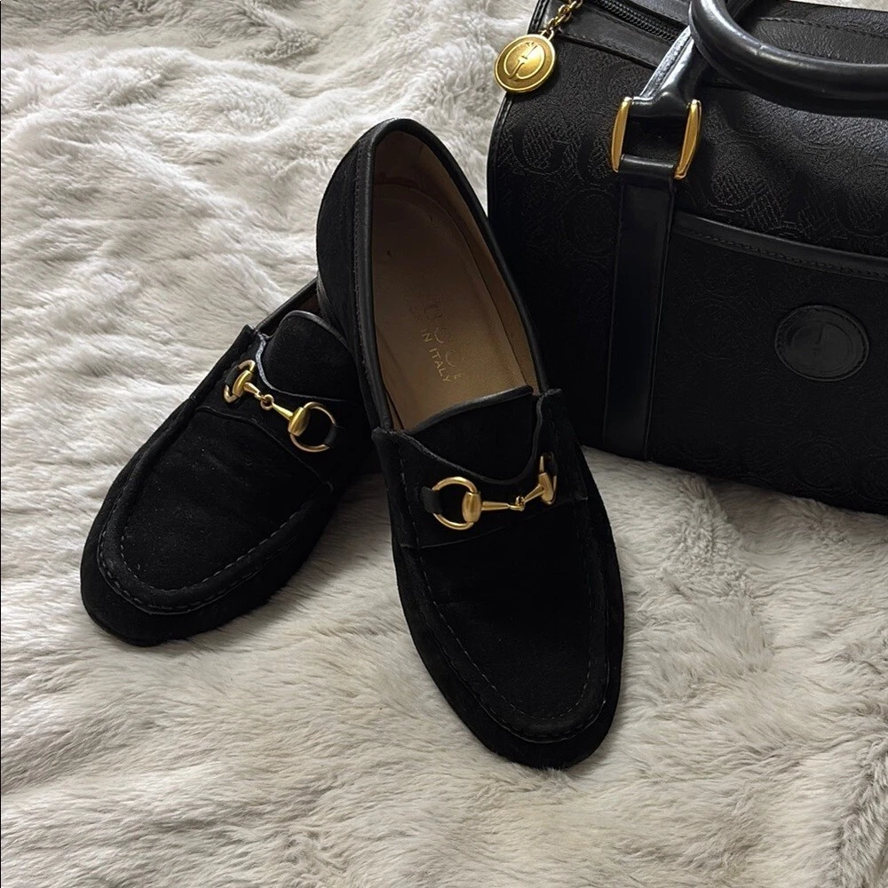 Mocassins Gucci noirs avec quincaillerie dorée