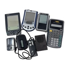Lot of 8 Handheld Electronics 2 PDAs Scientific Calculator MP3 Player Untested