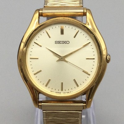 Vintage Seiko Mens Watch 34mm Gold Tone Stretch Band V701-7A29 New