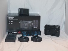 Panasonic GX85 Body With box, manuals, 6x batteries, 4x chargers, and half-case